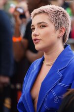 Florence pugh oppenheimer photo call boob baring look 8