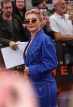 Florence pugh oppenheimer photo call boob baring look 11
