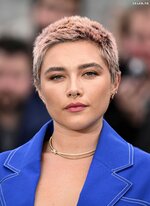Florence pugh oppenheimer photo call boob baring look 13