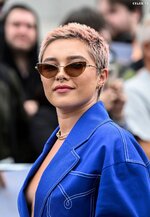 Florence pugh oppenheimer photo call boob baring look 23