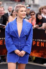 Florence pugh oppenheimer photo call boob baring look 26