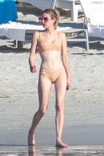 Emma roberts wears a striped bikini as she hits the beach with friends in punta mita mexico 18