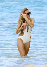 Wears a stylish cut out white swimsuit in Barbados 3112 6