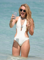 Wears a stylish cut out white swimsuit in Barbados 3112 8