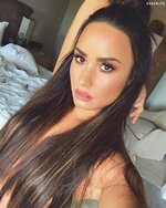 demi_lovato_hair_boobs.jpg