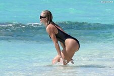 Khloe kardashian in a black swimsuit turks and caicos 07 03 2022 060e2ada676ac9c4a703c7fe