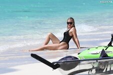 Khloe kardashian in a black swimsuit turks and caicos 07 03 2022 89c2d69f06ad8f85a998c1c8