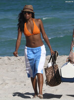 Gabrielle Union   in her sexy orange swimsuit  7