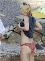 Dakota Johnson    Topless candids in Italy 2014 4