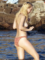 Dakota Johnson    Topless candids in Italy 2014 6