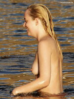 Dakota Johnson    Topless candids in Italy 2014 7