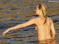 Dakota Johnson    Topless candids in Italy 2014 8