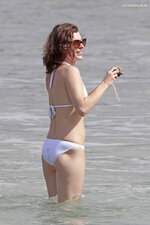 Milla jovovich white bikini 4