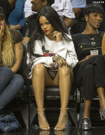 Sexy Rihanna in shorts watching an NBA game 1 1