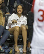Sexy Rihanna in shorts watching an NBA game 14