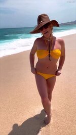 Britney Spears posing in yellow bikini  5