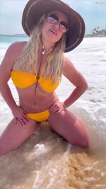 Britney Spears posing in yellow bikini  9