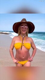 Britney Spears posing in yellow bikini  10