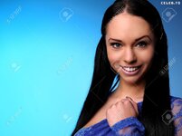 20524177 portrait of a sexy busty girl posing in a blue shirt Stock Photo