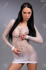 20524755 sexy busty girl in a white net skirt Stock Photo